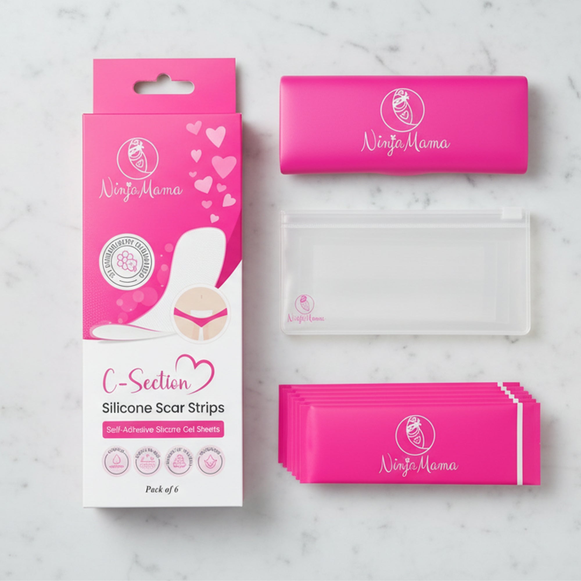 silicone scar strips with pink packaging and clear zip lock bag and plastic keep clean case on a marble background